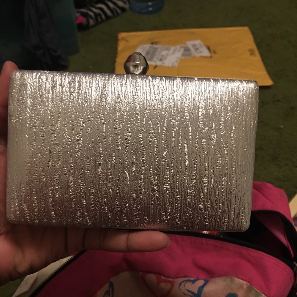 A small sliver hand bag